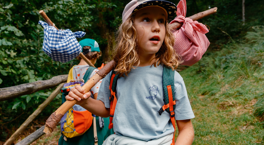 Two children hiking in nature