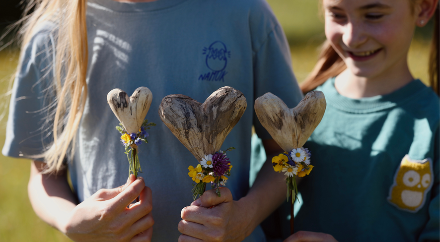 carving wooden hearts for Mother's Day