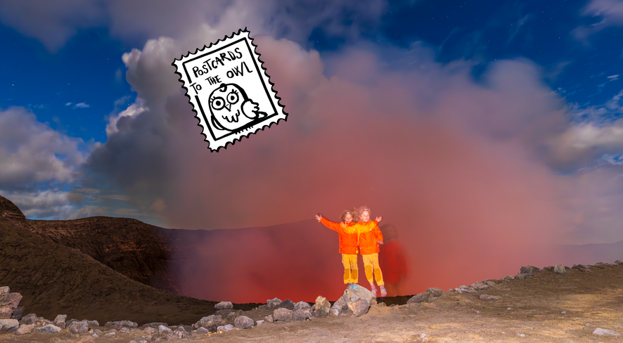 children standing in front of a volcano