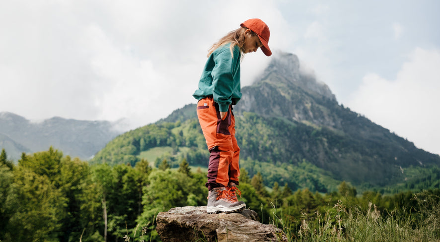 child outside wearing Cordura pants