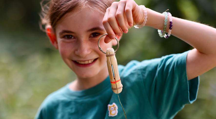 Child with a finished marmot whistle