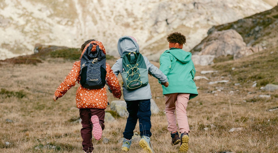 Kids running in the mountains